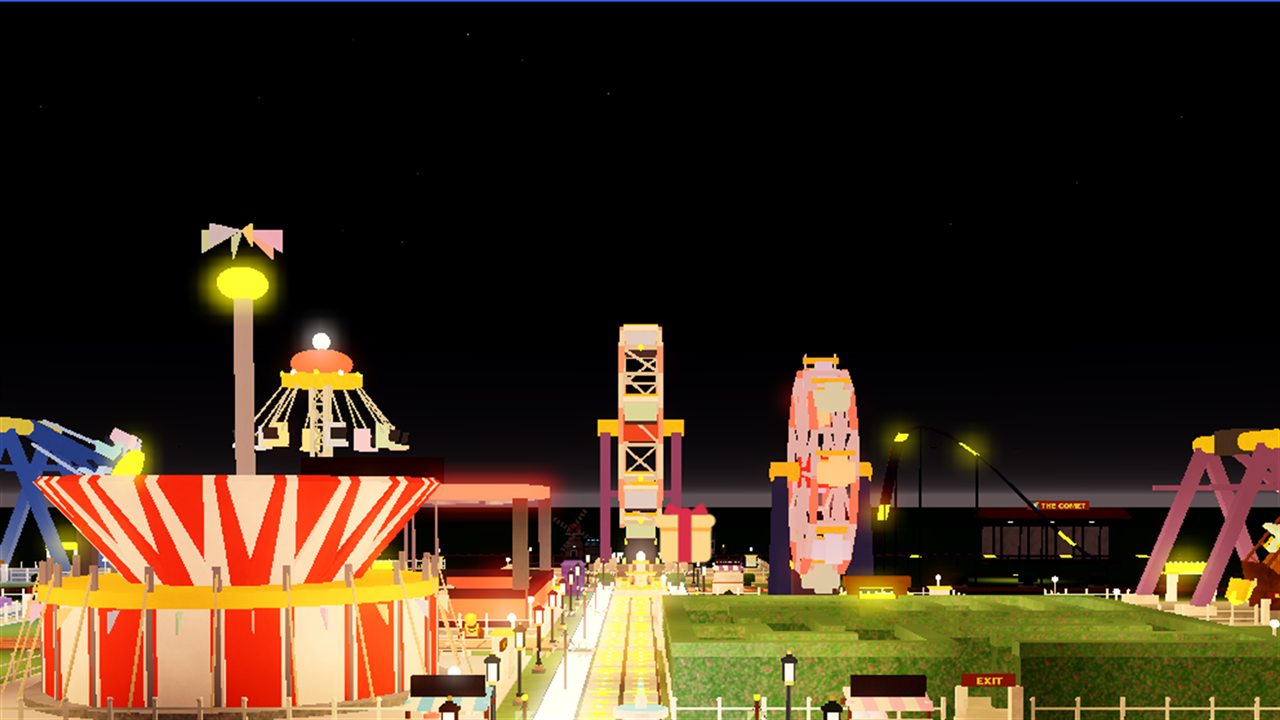 The main avenue at night, lined with stalls, lamps and rides
